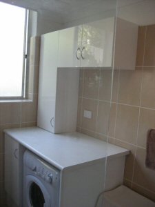laundry nook within a bathroom